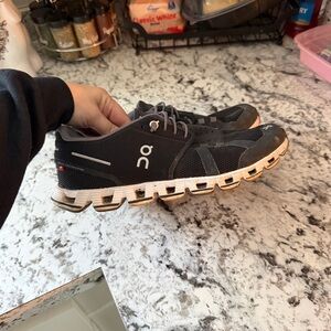 On Running Women’s black and White Athletic Shoes